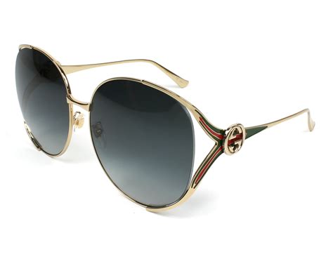 gucci men sunglasses gold frame.